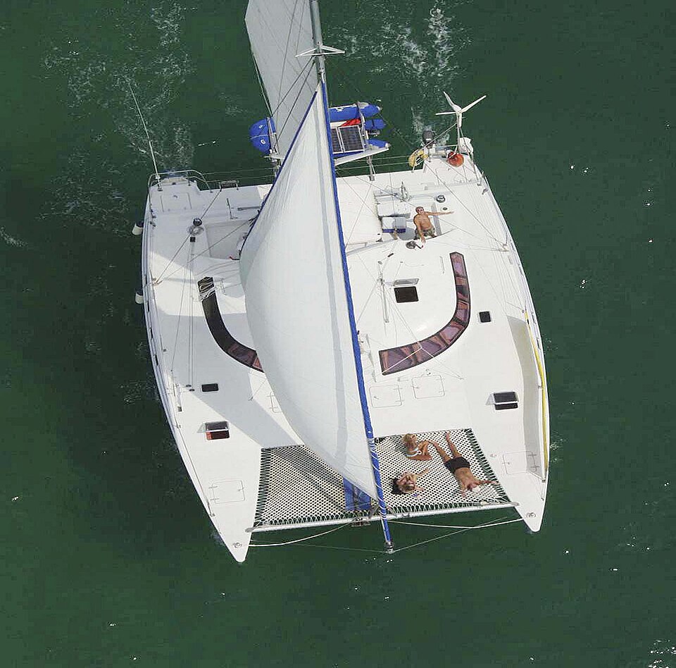 Illustrative a sailing catamaran photograph